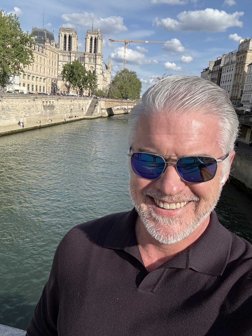 Haden Kirkpatrick on a bridge over the Seine in Paris, Notre-Dame in the background